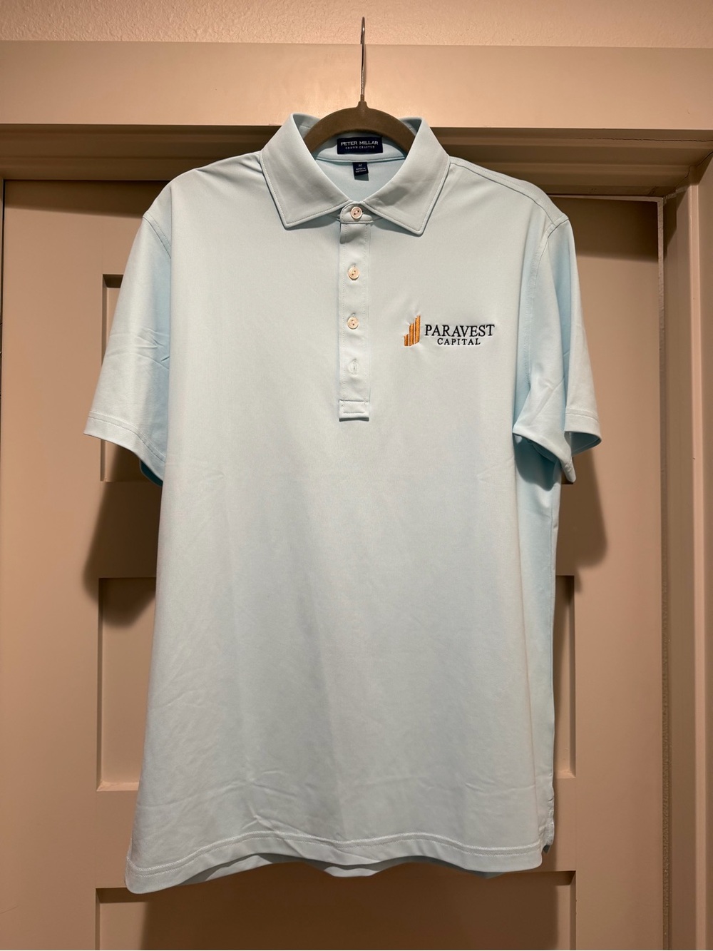Peter Millar Crown Crafted Light Blue Performance Polo with company Logo M